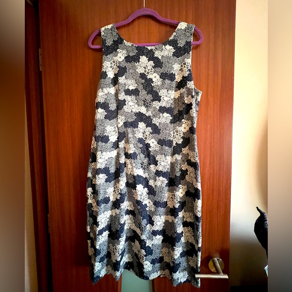 Ivanka Trump - sleeveless midi dress.